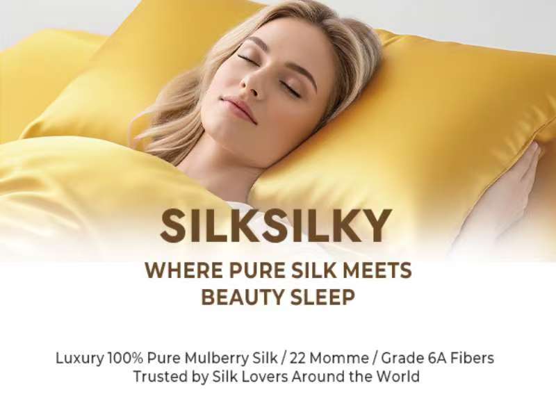 A person with blonde hair sleeping peacefully on yellow silk pillowcases