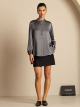 Light beige silk blend blouse with stand collar, button front and high-low hem