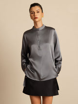 Light green 19 momme silk blouse with stand collar, button front, and high-low hem