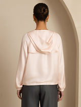 Women's silk hooded jacket with large flap pockets, high neck and relaxed fit