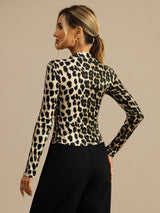 Women’s silk jersey mock neck top with bold wild animal print and long sleeves