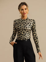 Wild animal print silk jersey mock neck top with long sleeves and slim fit