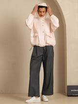 White silk hooded jacket with large flap pockets and drawstring hem
